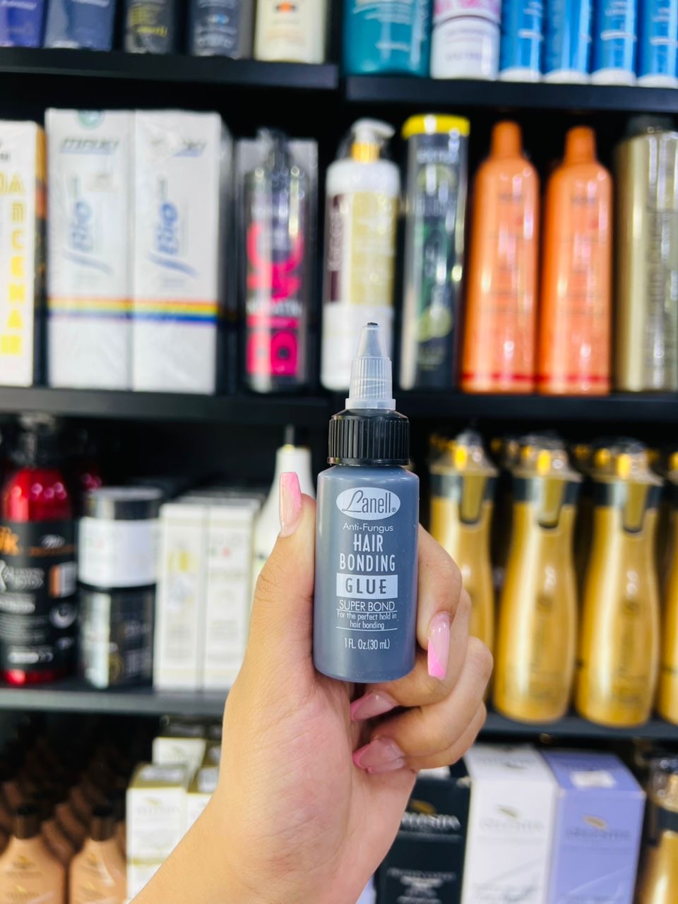 8f593b48-4f62-40a2-b779-bb1ae85a446d.jpeg Lanell – Colle pour Extension Capillaire – 30 ml – Image 1